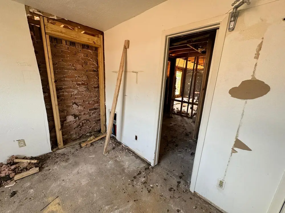 Interior wall opened down to the brick during repair